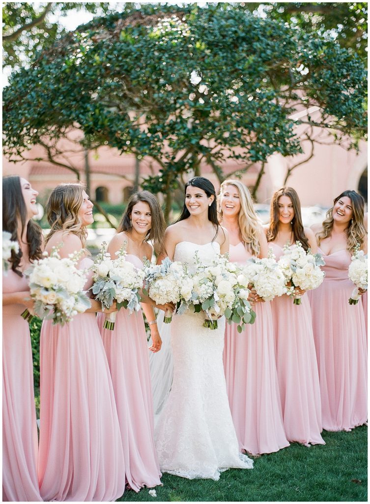 ladies in blush bridesmaids dresses