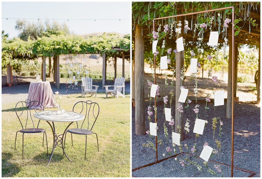 seating chart with hanging florals from copper pipe