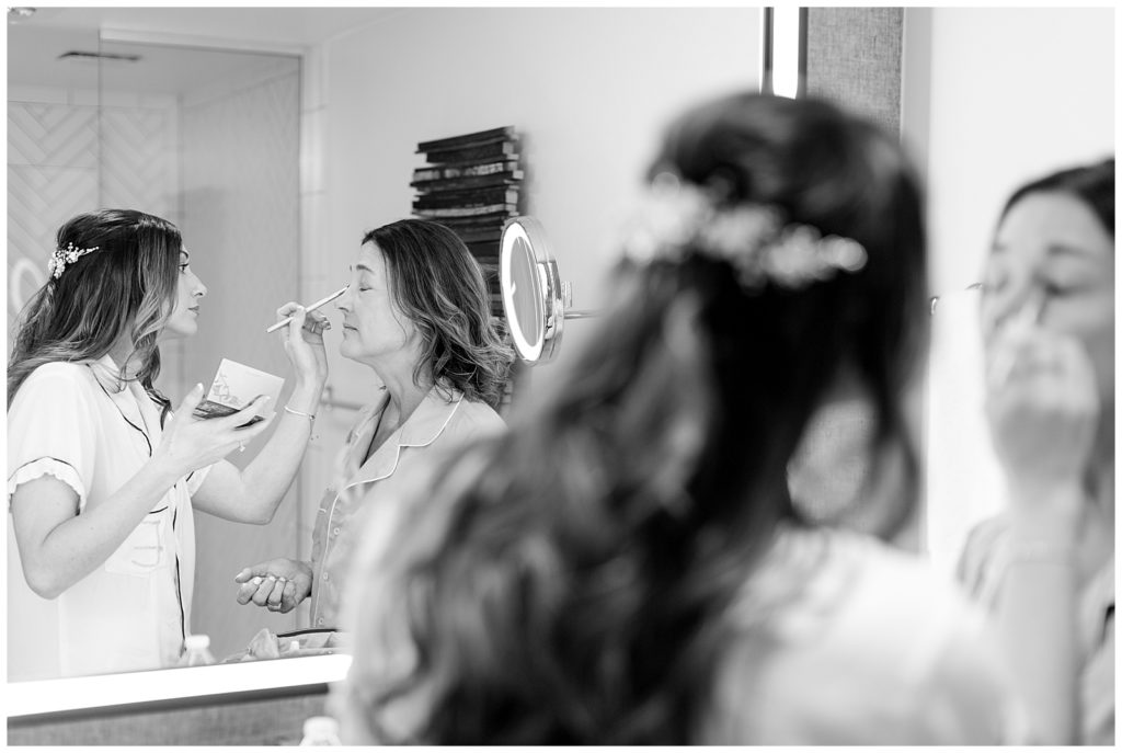 Bride helping her mom with makeup