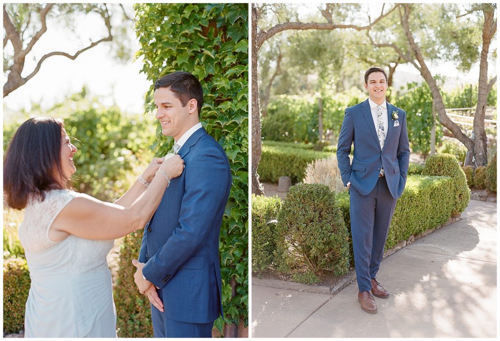 groom wearing blue suit for wedding at Viansa Sonoma