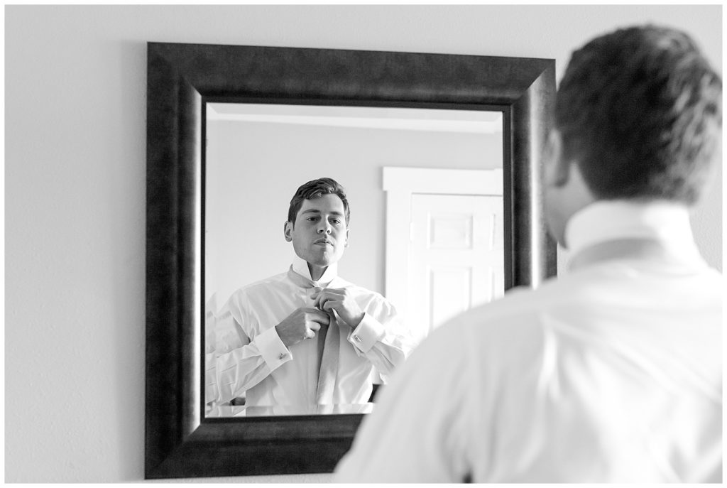 groom getting ready for wedding at Gorge Crest Vineyards