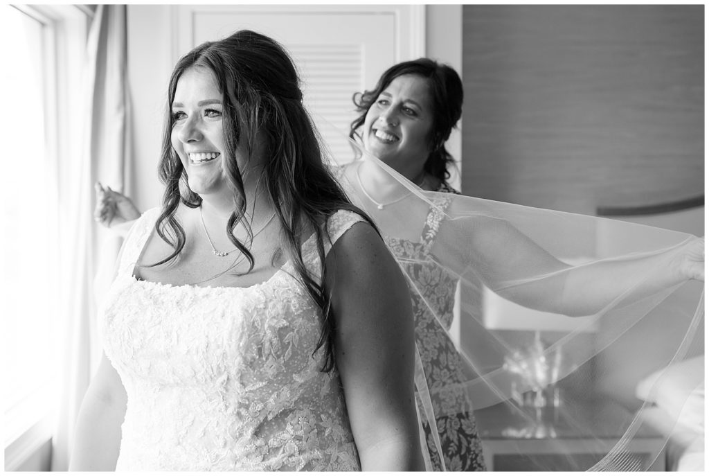 Mom and bride getting ready on wedding day for Ringling Wedding