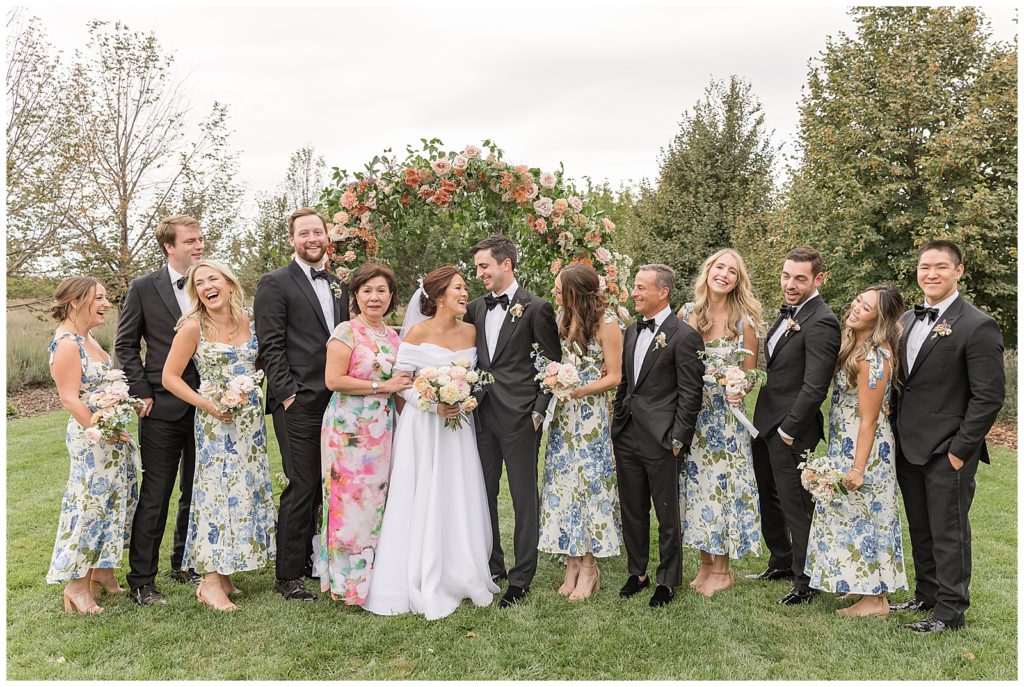 wedding party with floral dresses from reformation for Bear Flag Farm wedding