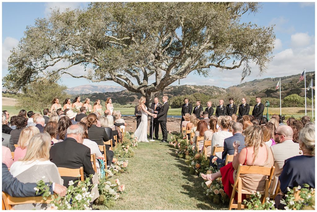 wedding ceremony by the oak tree at Club at Pasadera