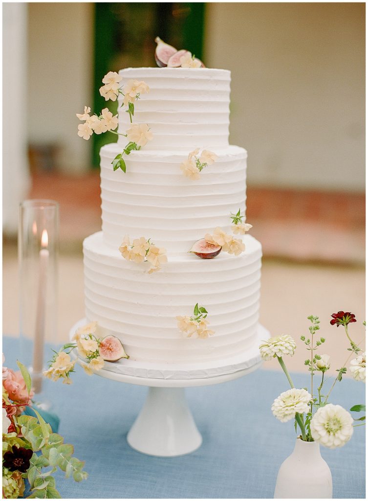 Three tiered wedding cake with ribbing texture