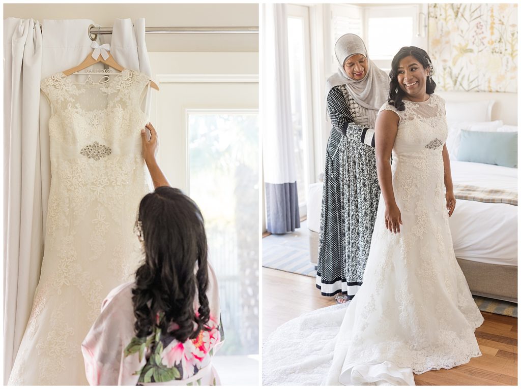 bride getting into dress with help of mom