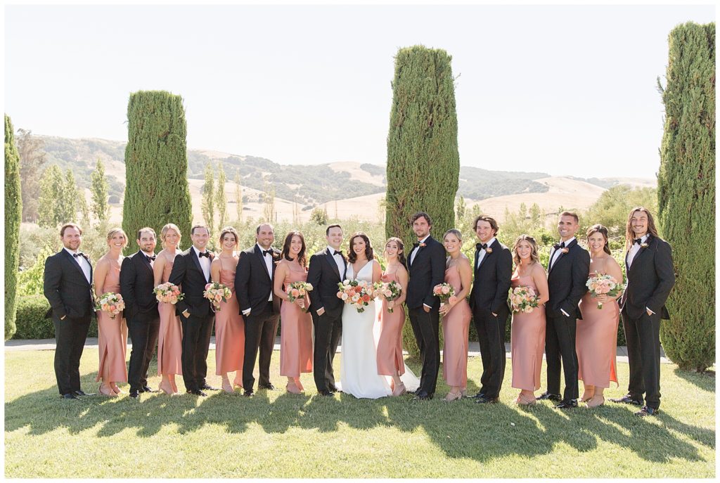 bridesmaids in pink and coral for viansa wedding day
