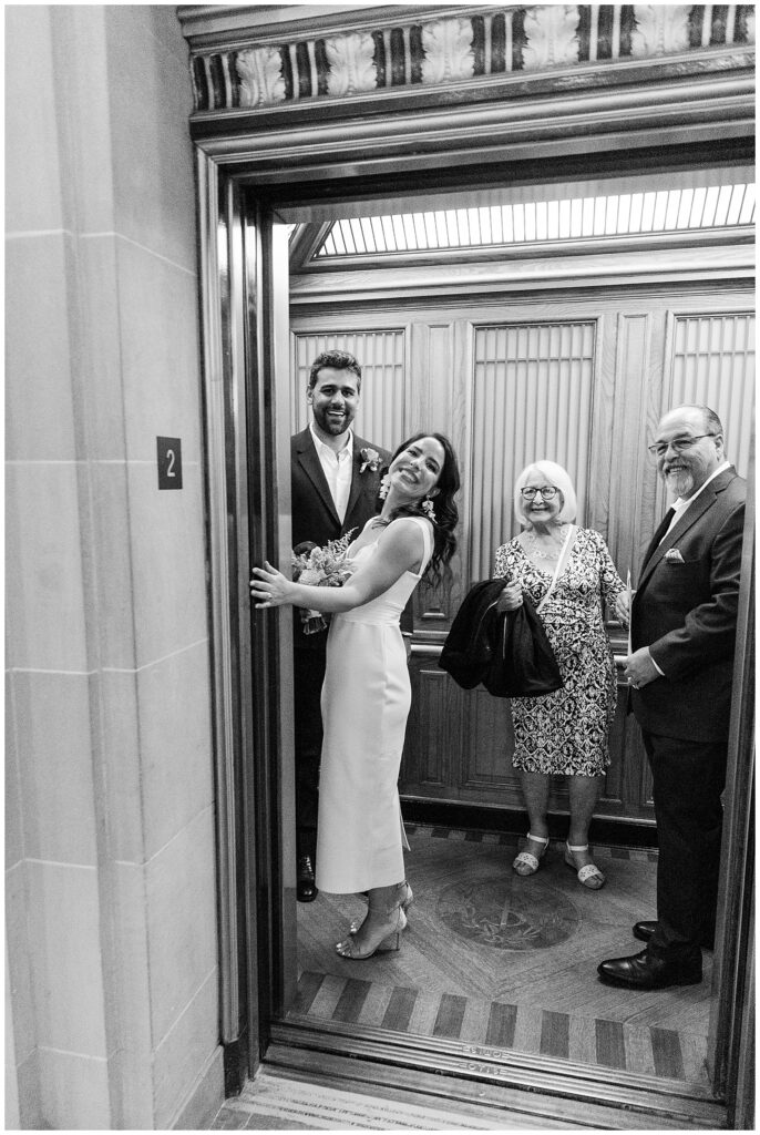 Fun wedding photos with Elevator at SF City Hall