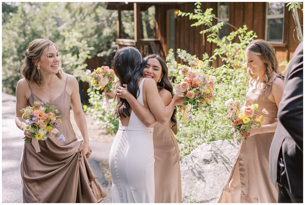 hugs after wedding ceremony at Evergreen Lodge wedding