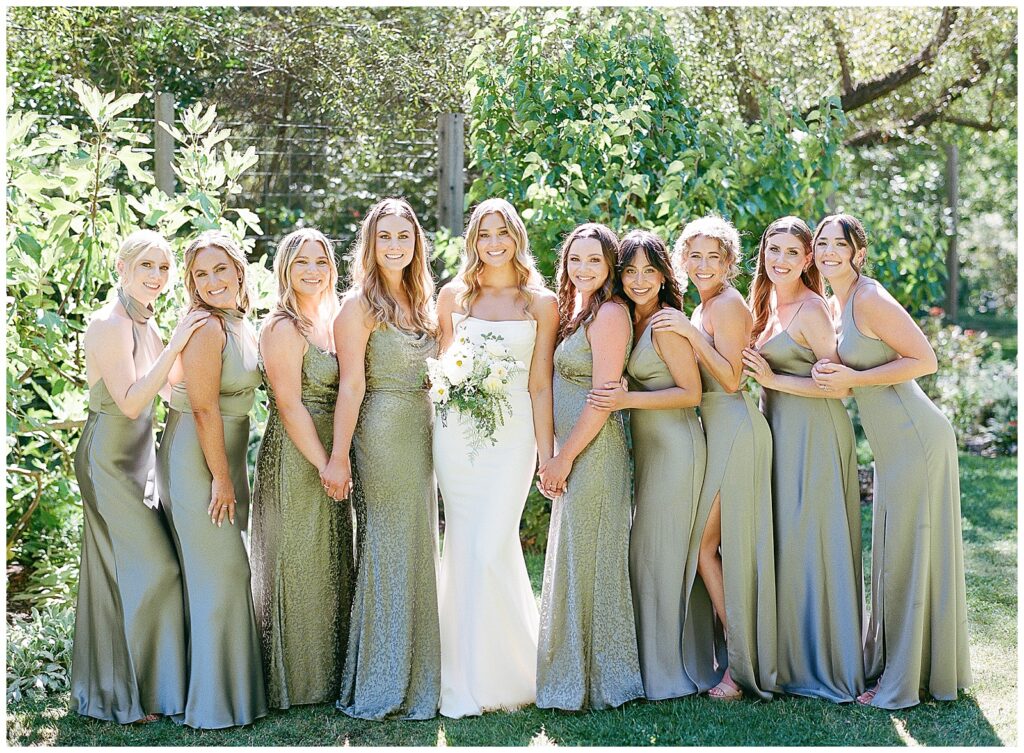 Bridesmaids in sage green bella bridesmaids Jenny Yoo dresses