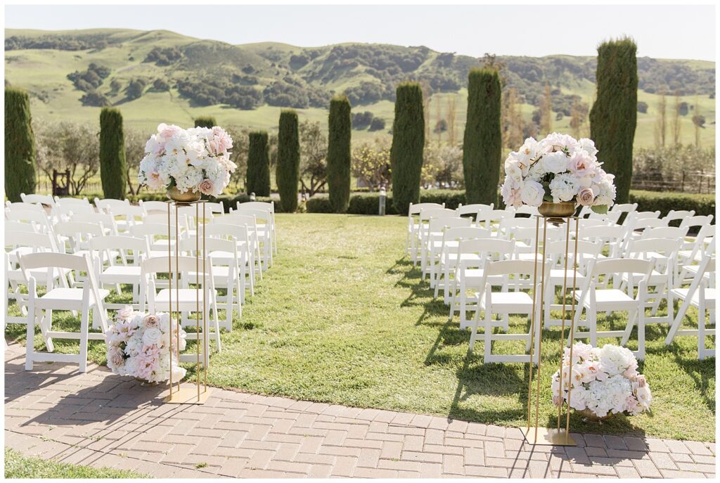 Wedding ceremony at Viansa with white orchids