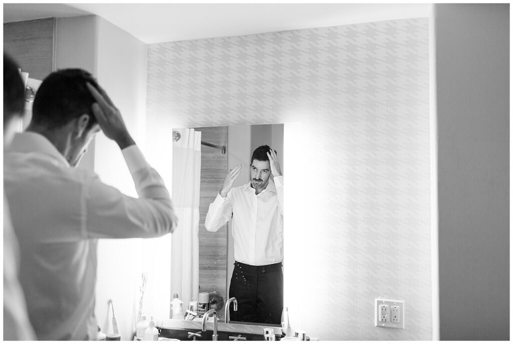 Groom getting ready at The Lodge Sonoma before wedding