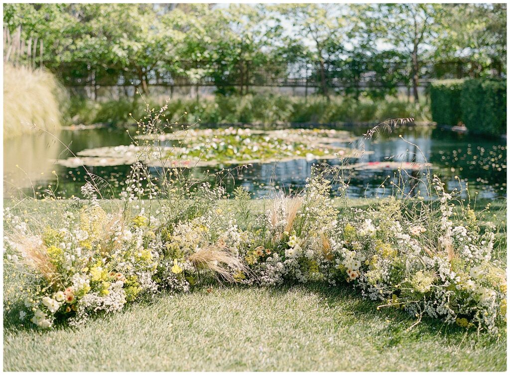 Grounded floral install for wedding ceremony at Cornerstone Sonoma