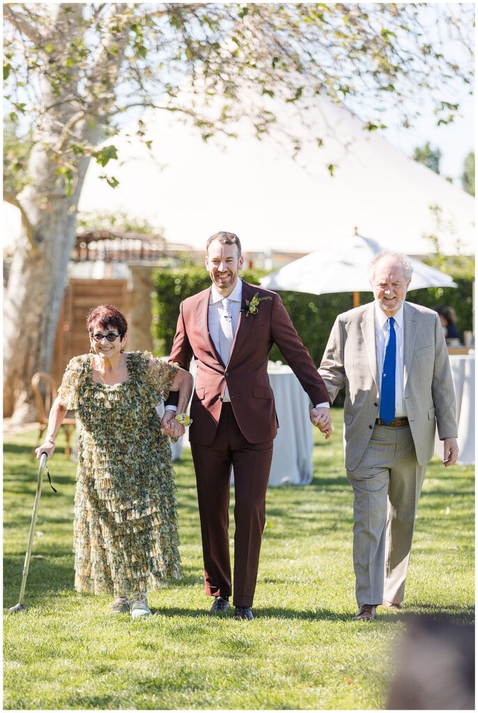 Groom walking down the aisle at Cornerstone Sonoma